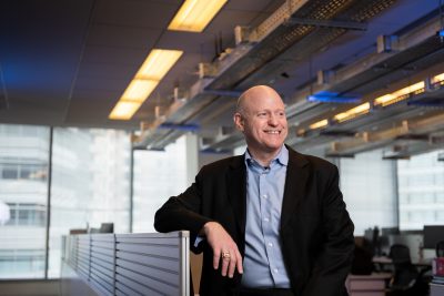 Commonwealth Cyber Initiative Research Director Eric Burger, shown at the CCI xG Testbed at the Virginia Tech Research Center in Arlington, Va., is helping guide the future of secure mobile networks. 